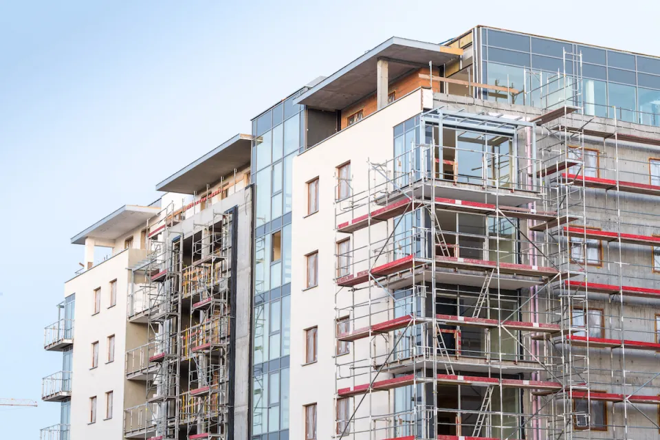 Multistory apartment building under construction.